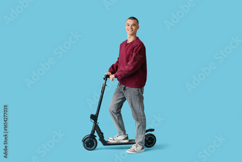 Teenage boy with electric s...