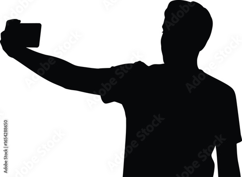 Man taking a selfie with a smartphone in a striking black silhouette