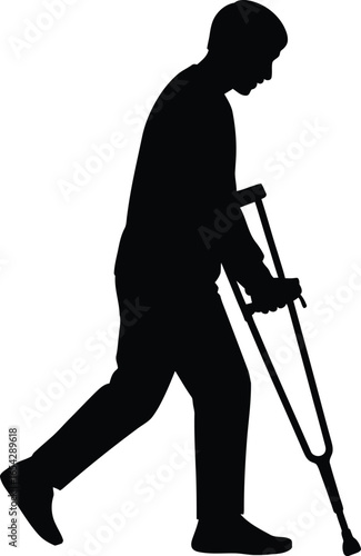 Man with crutches walking slowly in a stark black silhouette against a white background
