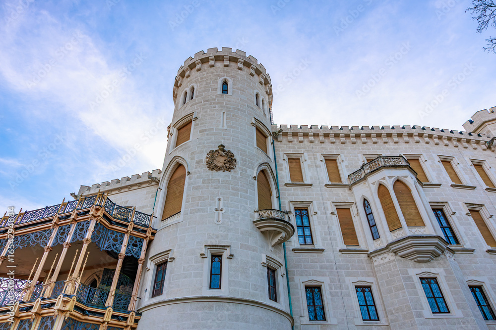 Fototapeta premium Magnificent european castle facade under a clear blue sky