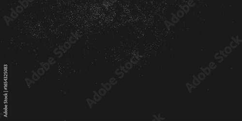 Snowstorm texture. Bokeh lights on black background, shot of flying snowflakes in the air