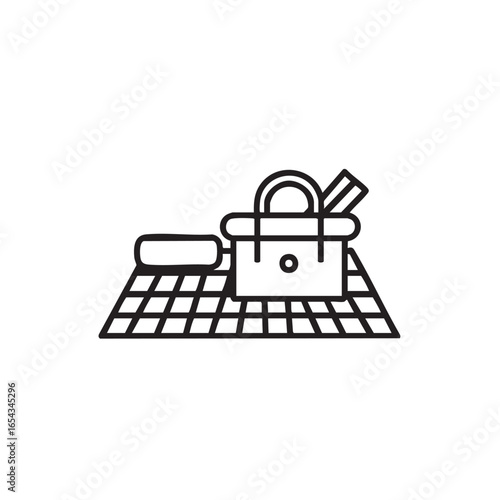 A line drawing of a picnic blanket with a basket.