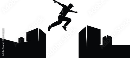 Silhouette of a man doing parkour jumping between buildings in city