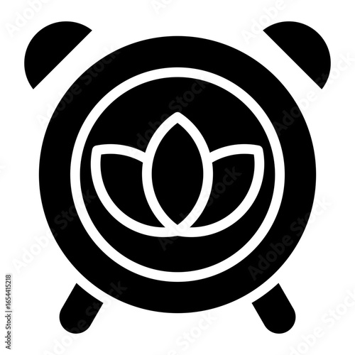 The classic alarm clock icon with bells symbolizes time, routine, lotus flower reminds us of the importance of taking time to practice relaxation meditation.