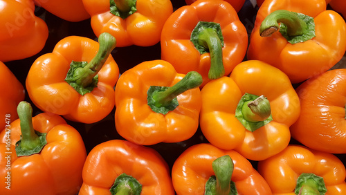 Orange Bell Peppers at the farmers market, Natural food background