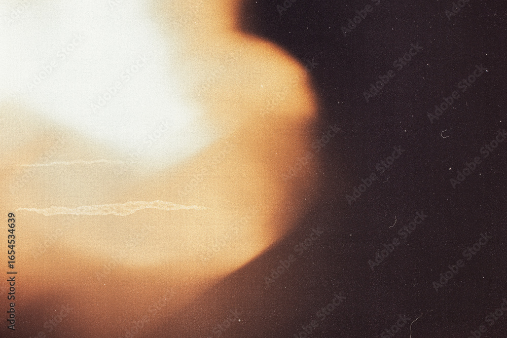 Obraz premium light leak overlay effect with scratch dust and bokeh light leaks,retro grain noisy film distressed texture light leak flare on black background,retro film texture overlay