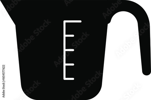 Black measuring cup with measurement lines on a cooking concept