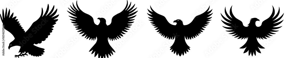 Fototapeta premium Four Eagle Silhouettes: Majestic Birds in Flight