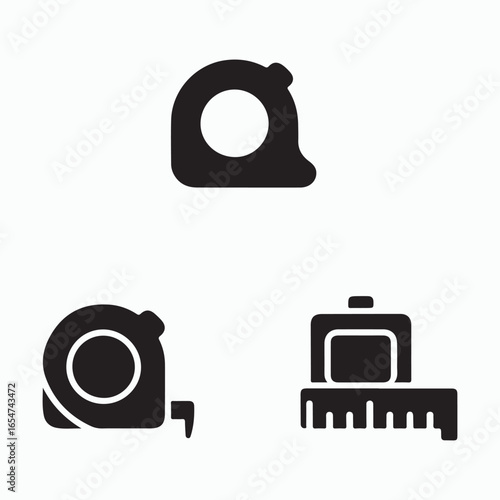 Three black silhouettes of measuring tapes on a white background
