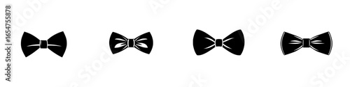 Bow ties displayed in a row showcasing different designs and styles, ideal for formal events and special occasions