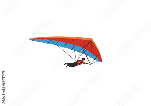 A person in a hang glider with an orange red and blue wing soars through the air