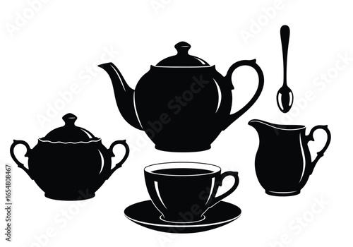 Tea set with teapot, sugar bowl, creamer, cup, saucer, and spoon isolated on white background