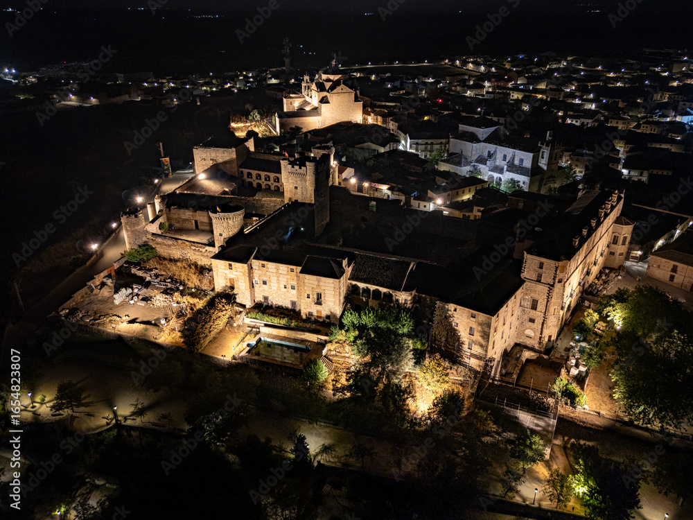 Fototapeta premium Nighttime aerial images of Oropesa Castle in Toledo on a clear night.