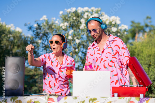 DJs playing music at summer garden party