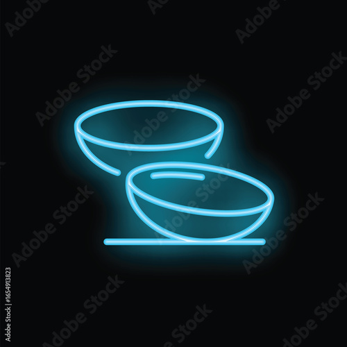 Neon sign of contact lenses for eyesight correction on a black background