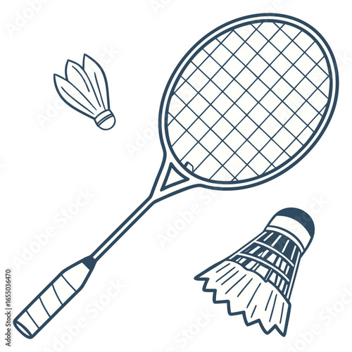 White badminton shuttlecock and two badminton rackets on blue floor sport badminton court. Outdoors. Close up.