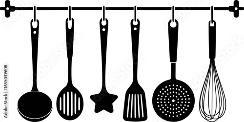 Kitchen utensils hanging on a rack cooking tools