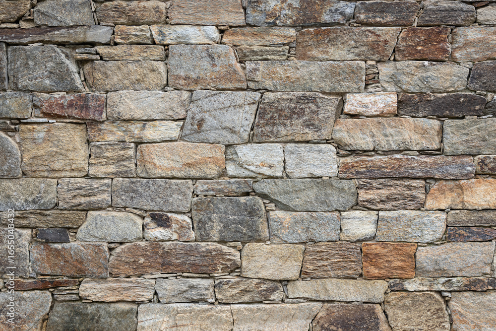 Obraz premium Dry masonry Stone wall background texture