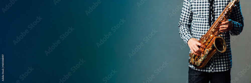 Fototapeta premium Saxophone Player Wide Banner with Copy Space