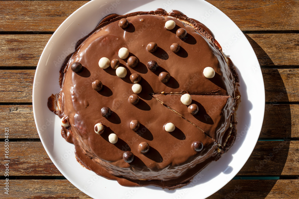 Fototapeta premium Homemade chocolate tart topped whit chocolate balls