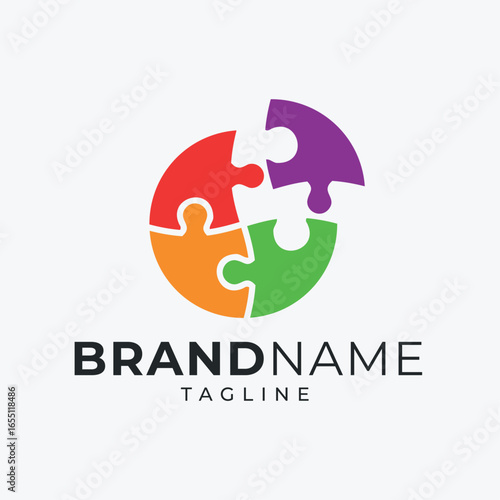 Circle Puzzle Logo. Teamwork Symbol In Round Shape.
