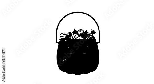 A black silhouette of a jackolantern bucket overflowing with Halloween candy.