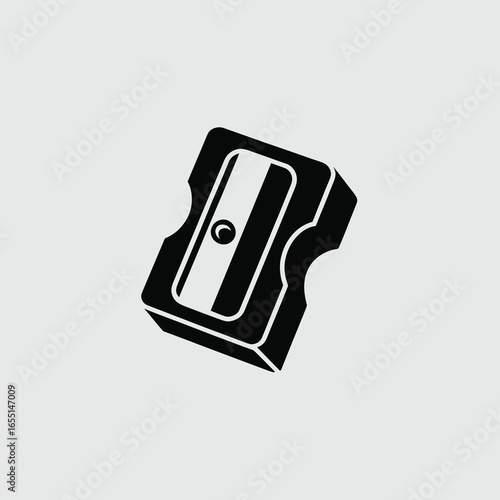 black vector silhouette of a classic pencil sharpener with visible blade slot and slightly angled body