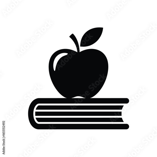 black vector silhouette of a closed hardcover book with a neatly stacked apple on top, apple with a single leaf
