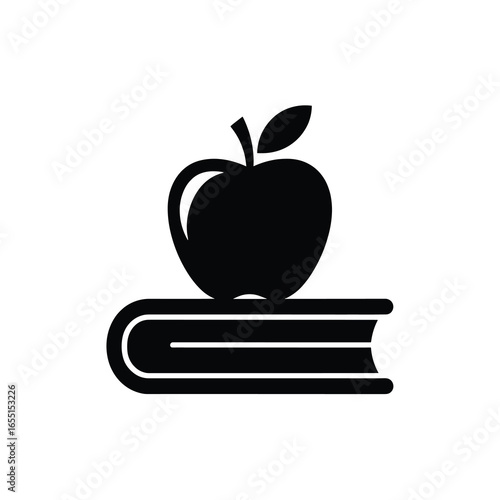 black vector silhouette of a closed hardcover book with a neatly stacked apple on top, apple with a single leaf