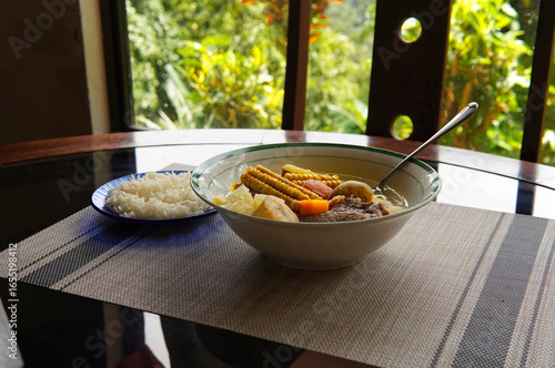 Olla de carne beef soup with vegetables, corn, potato, chayote, plantain, carrot, and beef. Typical dish of Costa Rica and Central America. Beef broth or meat soup accompanied with white rice.