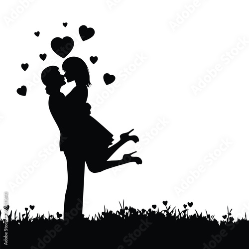 Romantic Silhouette of a Couple Embracing  in a Grassy Landscape Depicted in Black