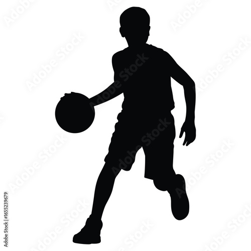 Young basketball player dribbling silhouette