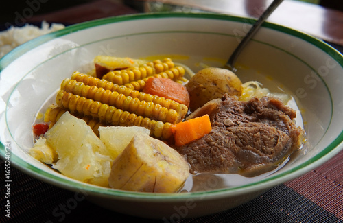 Close-up of a typical Costa Rican soup called Olla de Carne, a typical Costa Rican dish with white rice, chayote potatoes, carrots, and green plantains. Beef soup with vegetables,mexican soup