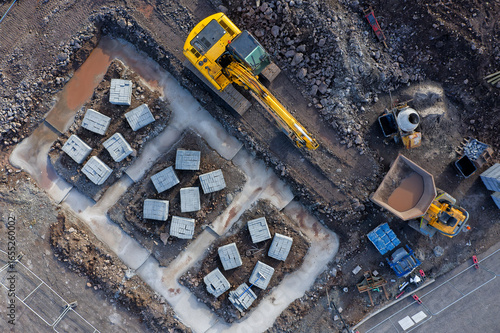 Construction building site aerial view showing materials