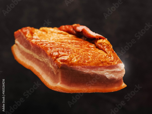 Wallpaper Mural Tasty smoked pork joint in the air, dark color painted background. Fine port meat ham popular in Poland and Baltic states. Premium product, ready to eat. Torontodigital.ca