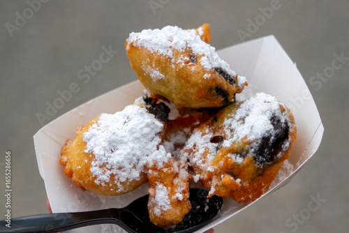 Fried dessert with powdered sugar
