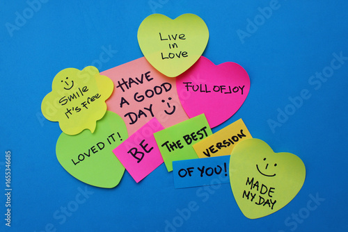 Several sticky notes with positive phrases