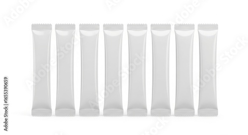 Seven white, blank, stick-pack sachets aligned in a row against a plain white background, suitable for mockups or product presentations.