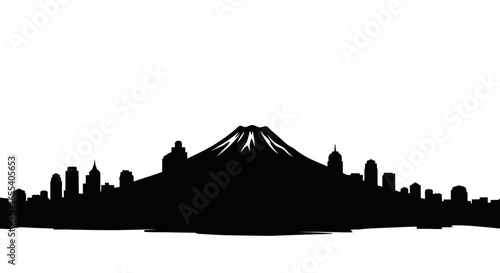 dramatic silhouette of mount fuji rising above a modern city skyline perfect for travel nature and urban design projects