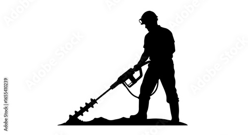 silhouette of a miner operating a powerful drill illustrating hard work resource extraction and industrial strength