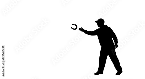 silhouette of man throwing horseshoe perfect for games luck and sportsthemed designs websites and marketing materials