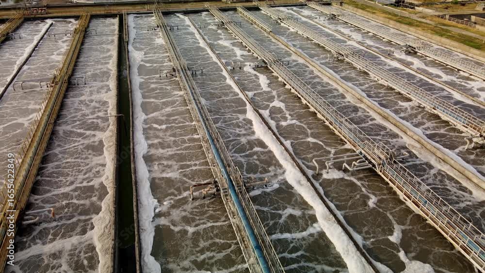 Top view of sewage treatment plant, wastewater treatment of a metropolis. Top view of sewage treatment plant, wastewater treatment of a metropolis.