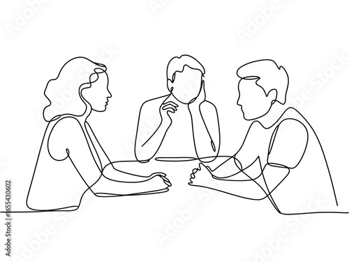 Three people in a meeting discussing ideas