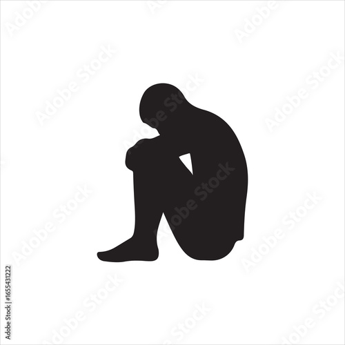 Black silhouette of a person hunched over with head in hands on white background despair