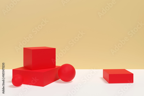 A red cube and three red balls are on a white table