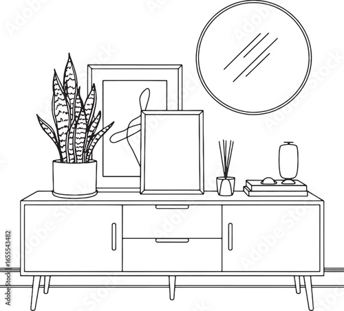Line drawing of a console table with a plant, framed art, and decorative accessories sideboard furniture