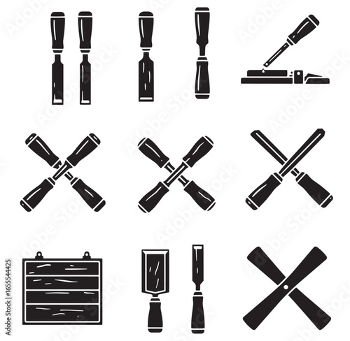 Assortment of various woodworking chisels in black and white isolated on white background