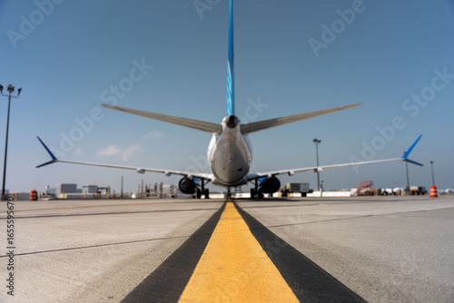 737-Max parked on the tarmac on a clear day in LAX.