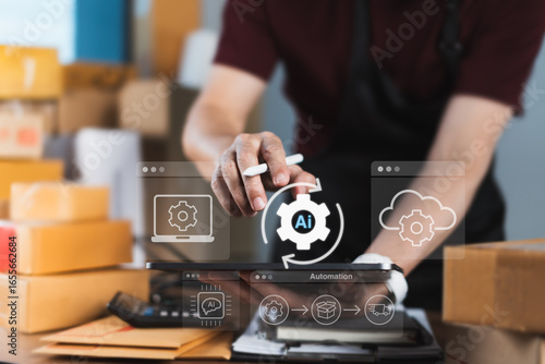 Online seller activating AI automation on tablet with logistics and cloud icons for smart inventory and e-commerce fulfillment efficiency
