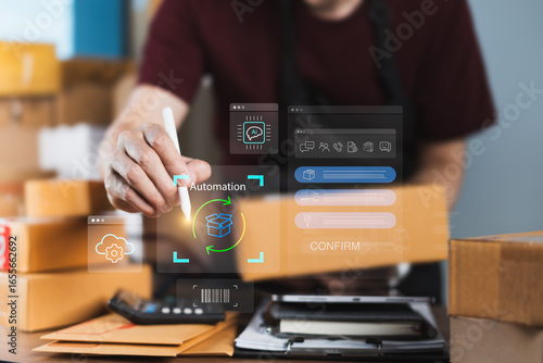 Online seller activating AI automation on tablet with logistics and barcode icons for smart order fulfillment and inventory management